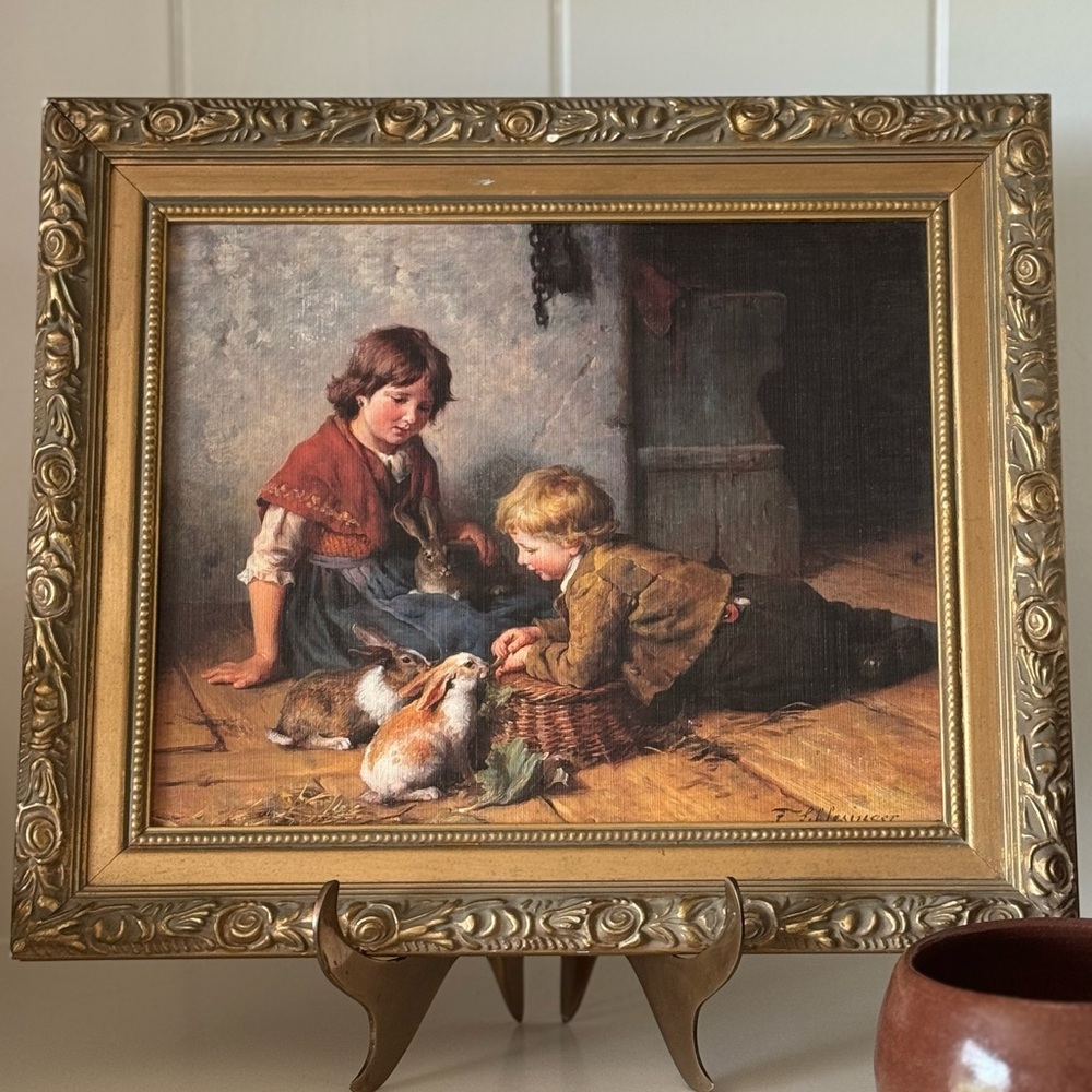 Oil painting of children and bunnies